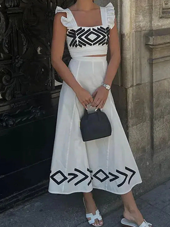 Dawn – High-Waisted Suspended Dress with Flutter Sleeves and Geometric Print