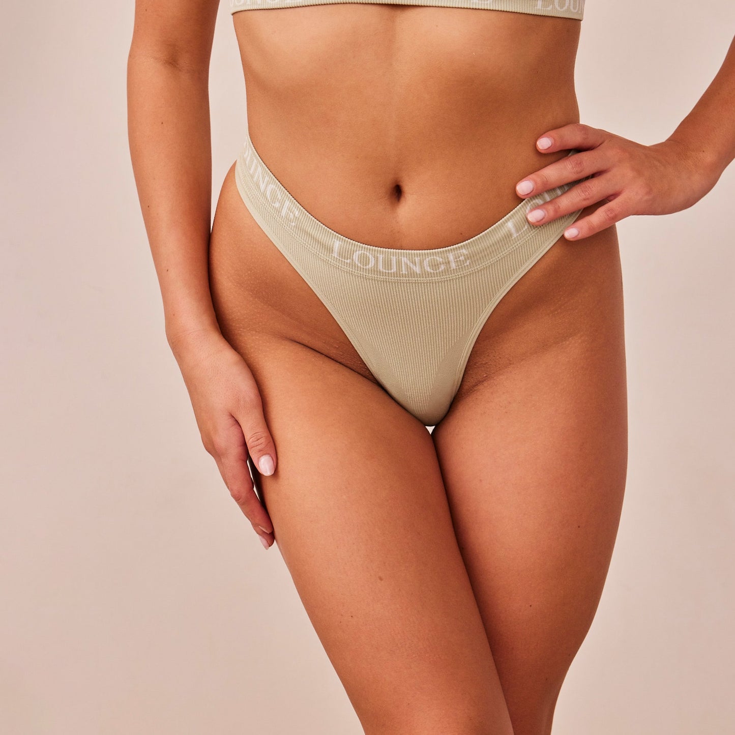 Tara – Seamless Olive Thong with Smooth Fit