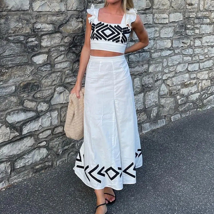 Dawn – High-Waisted Suspended Dress with Flutter Sleeves and Geometric Print