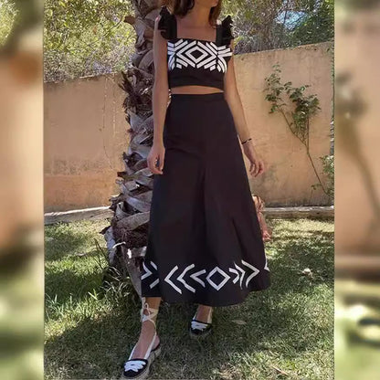 Dawn – High-Waisted Suspended Dress with Flutter Sleeves and Geometric Print