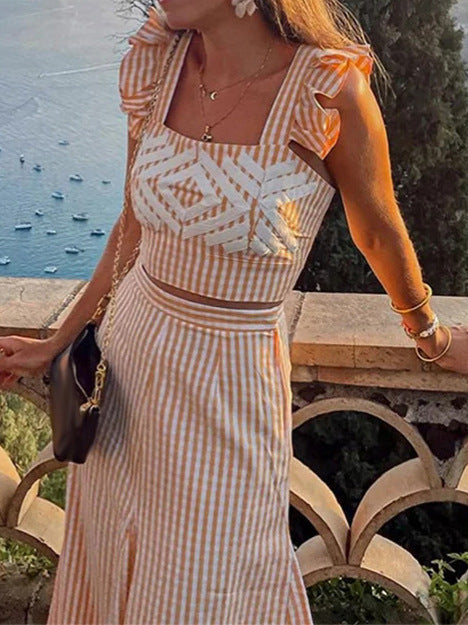 Dawn – High-Waisted Suspended Dress with Flutter Sleeves and Geometric Print