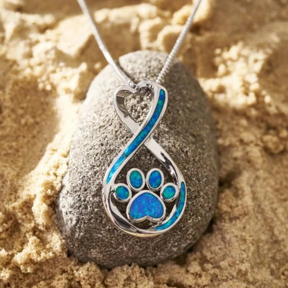 Natasha – Silver-Plated Opal Pendant with Bear Paw Design