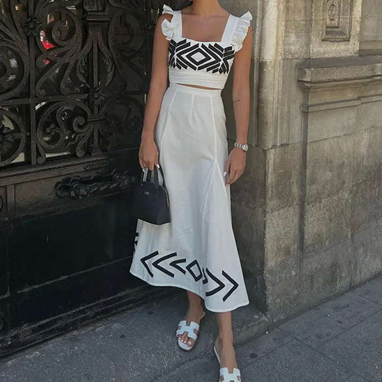 Dawn – High-Waisted Suspended Dress with Flutter Sleeves and Geometric Print