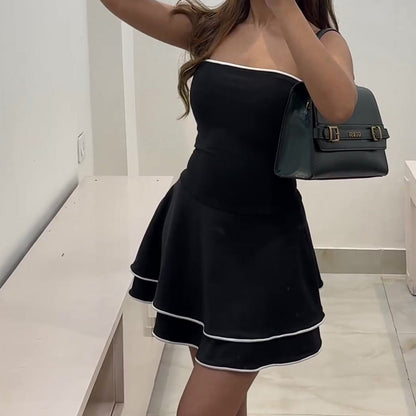 Brenda – Black Sleeveless Dress with Ruffle Skirt and White Edge